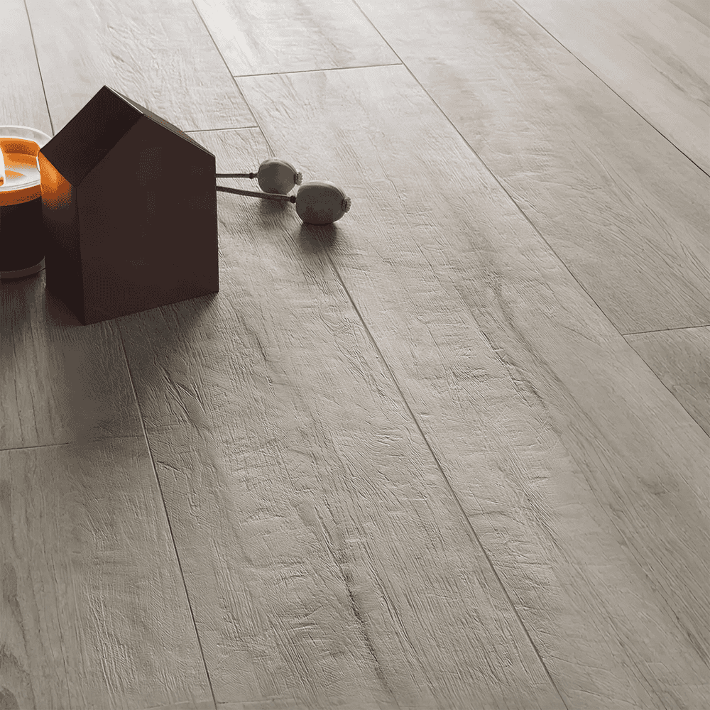 Close-up of porcelain tile showing realistic woodgrain pattern and texture