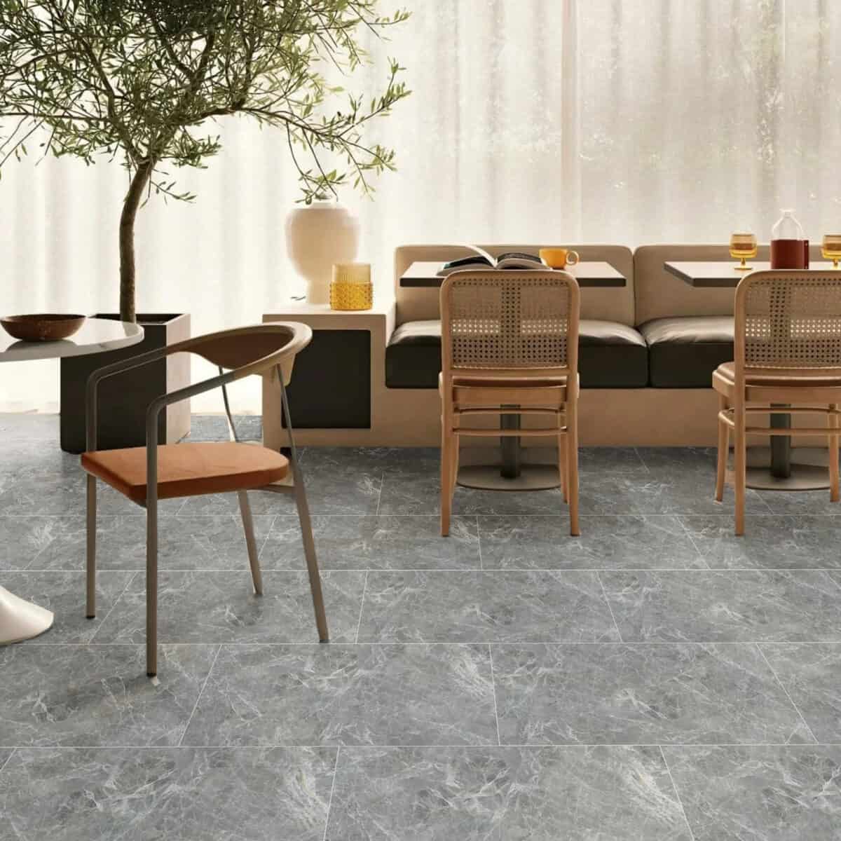 Contemporary Style Stormy Grey Stone Look SPC Vinyl Flooring in a modern dining area, offering a sophisticated canvas with its dynamic gray tones. This 100% waterproof, DIY-friendly SPC flooring resists scratches, stains, and dents, perfect for modern living.