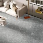Contemporary Style Stormy Grey Stone Look SPC Vinyl Flooring in a stylish living room, creating a sophisticated canvas with its dynamic gray tones. This 100% waterproof, DIY-friendly SPC flooring resists scratches, stains, and dents, ideal for modern living.