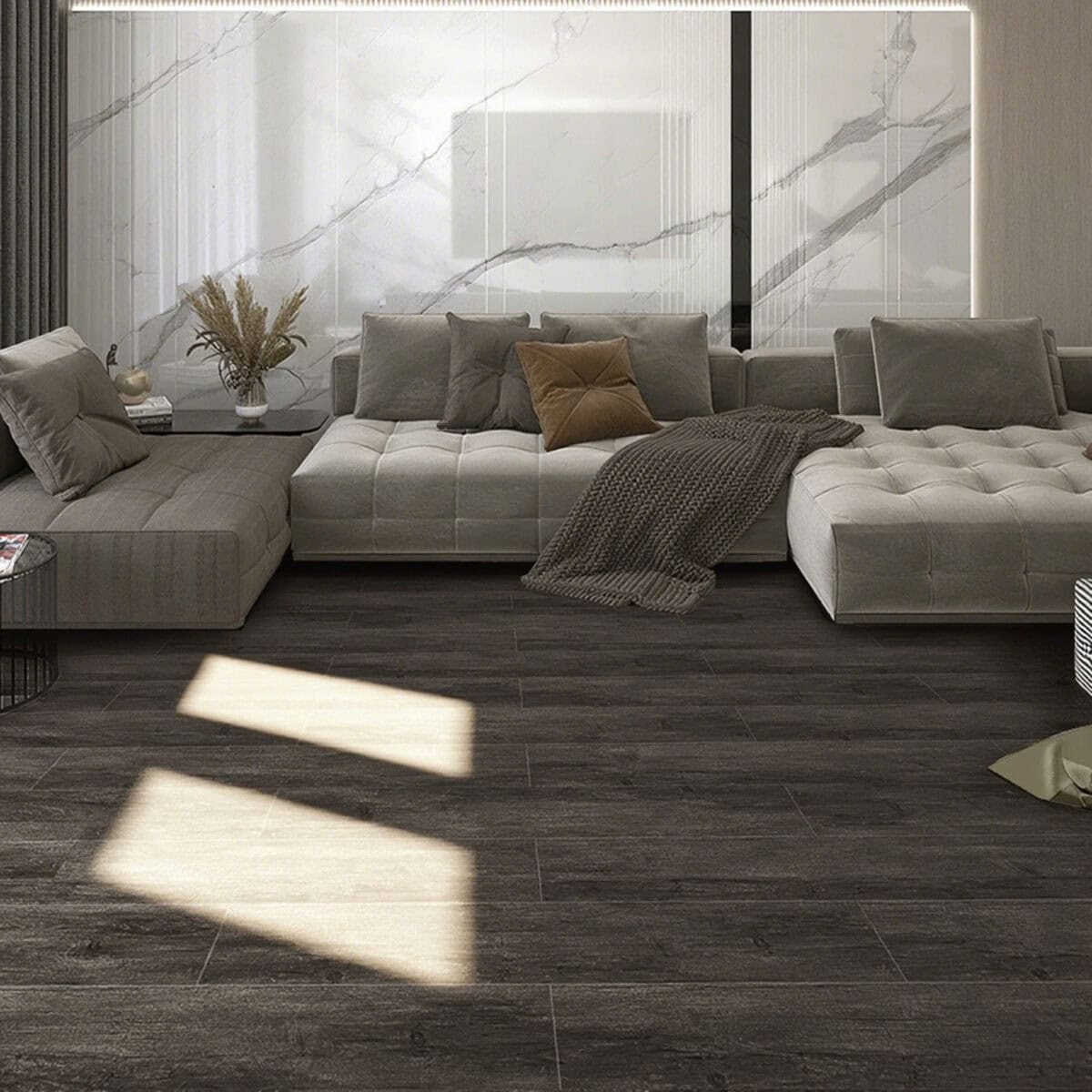 Industrial Loft Charred Pine Wood Look LVT Flooring in a modern living room, channeling a dramatic, authentic industrial loft spirit. This 100% waterproof LVT resists scratches, stains, and dents, offering a bold, character-rich foundation for expressive style.