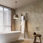 Light Luxury Beige White Wood Color Wood Look Tile on bathroom wall, creating a bright, airy, sophisticated atmosphere. This 100% waterproof porcelain tile offers unmatched durability, resisting scratches and stains for a worry-free, serene luxury.