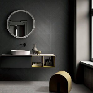 Modern Cool Charcoal Black Wood Look Tile on a bathroom wall, showcasing its deep, cool tones and herringbone pattern. This 100% waterproof porcelain tile offers unmatched durability and easy care for a bold, modern edge.