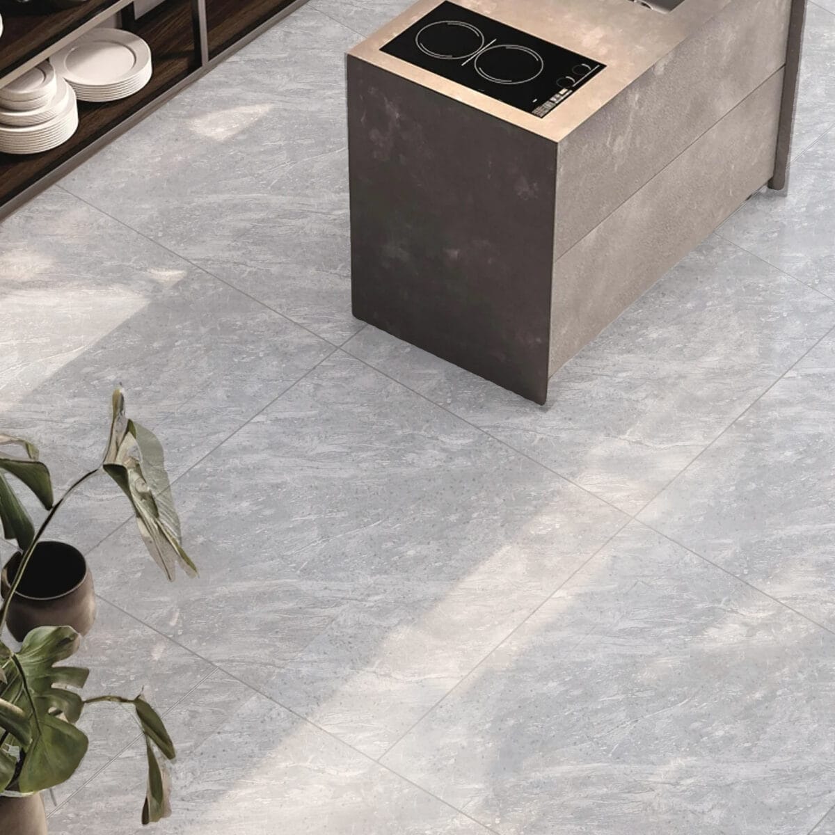 Modern Minimalist Pewter Slate Stock Look Vinyl Flooring in a bright kitchen, offering the refined aesthetic of natural slate. This 100% waterproof vinyl is brilliantly practical for busy areas, providing superior protection against scratches, stains, and dents, ensuring high-end style and peace of mind.