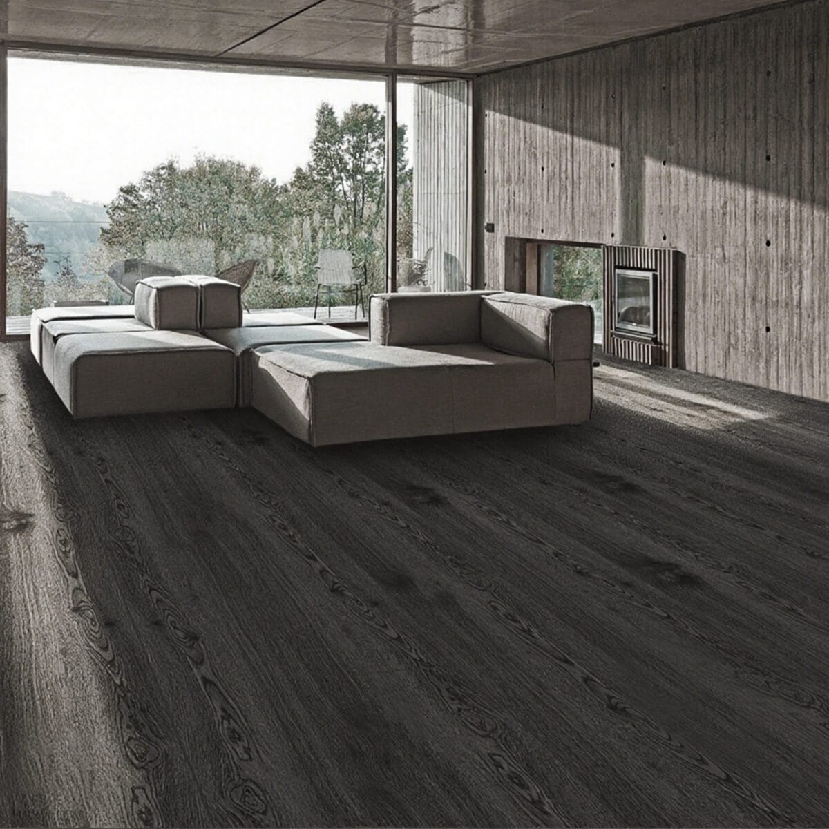 Urban Industrial Graphite Ash Wood Look LVT Flooring in a spacious living room, creating a powerful, sophisticated backdrop with its deep, near-black tones. This 100% waterproof LVT resists scratches, stains, and dents, offering high-impact style for modern industrial lofts.
