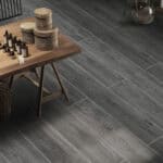 Timeless Classic Stormy Gray Wood Look Click Lock Vinyl Flooring SPC in a stylish living room, creating a space of enduring style with its versatile gray tones. This 100% waterproof, DIY-friendly SPC flooring resists scratches, stains, and dents, perfect for modern elegance.