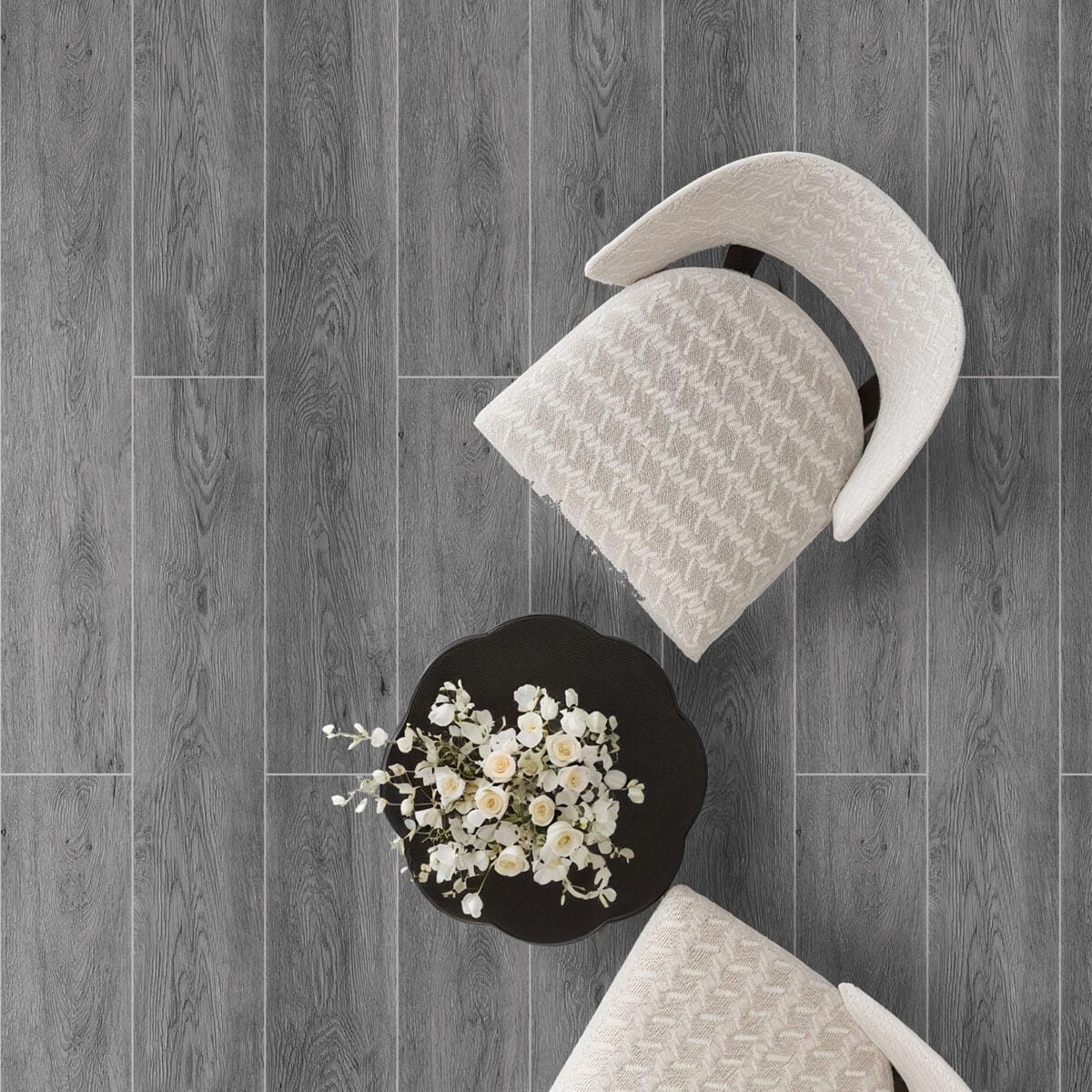 Timeless Classic Stormy Gray Wood Look Click Lock Vinyl Flooring SPC in a stylish living room, creating a space of enduring style with its versatile gray tones. This 100% waterproof, DIY-friendly SPC flooring resists scratches, stains, and dents, perfect for modern elegance.