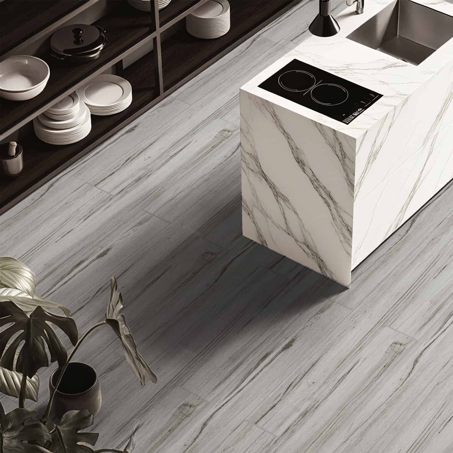 Scandinavian Light Gray Oak Wood Look Tile in a modern kitchen, creating a bright, serene atmosphere with its authentic wood grain. This 100% waterproof porcelain tile resists scratches and stains, offering easy care and unmatched durability for a worry-free Scandinavian lifestyle.