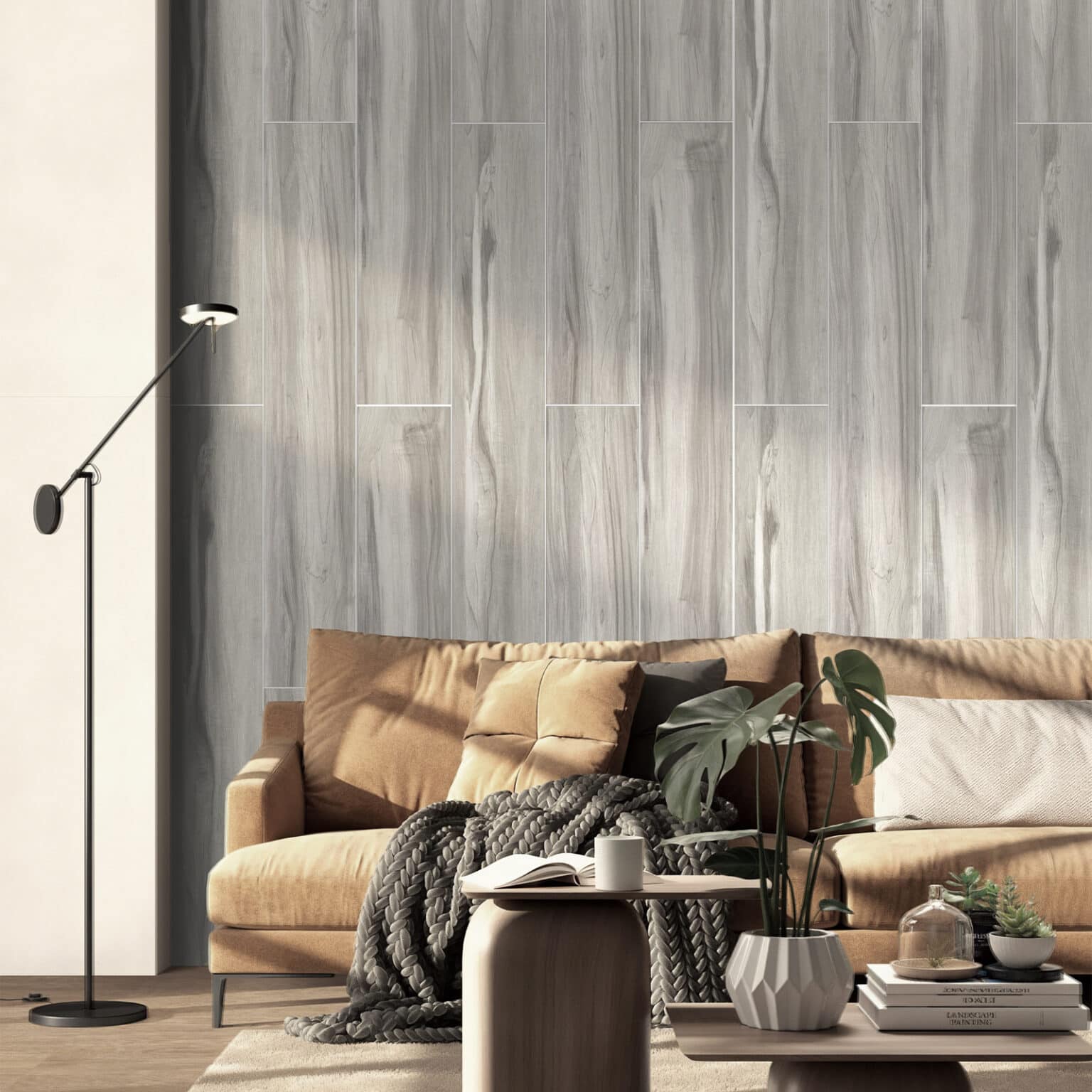 Scandinavian Light Gray Oak Wood Look Tile in a serene living room, extending to a feature wall, creating a warm, minimalist atmosphere. This 100% waterproof porcelain tile with authentic wood grain offers unmatched durability and easy care for quiet elegance.