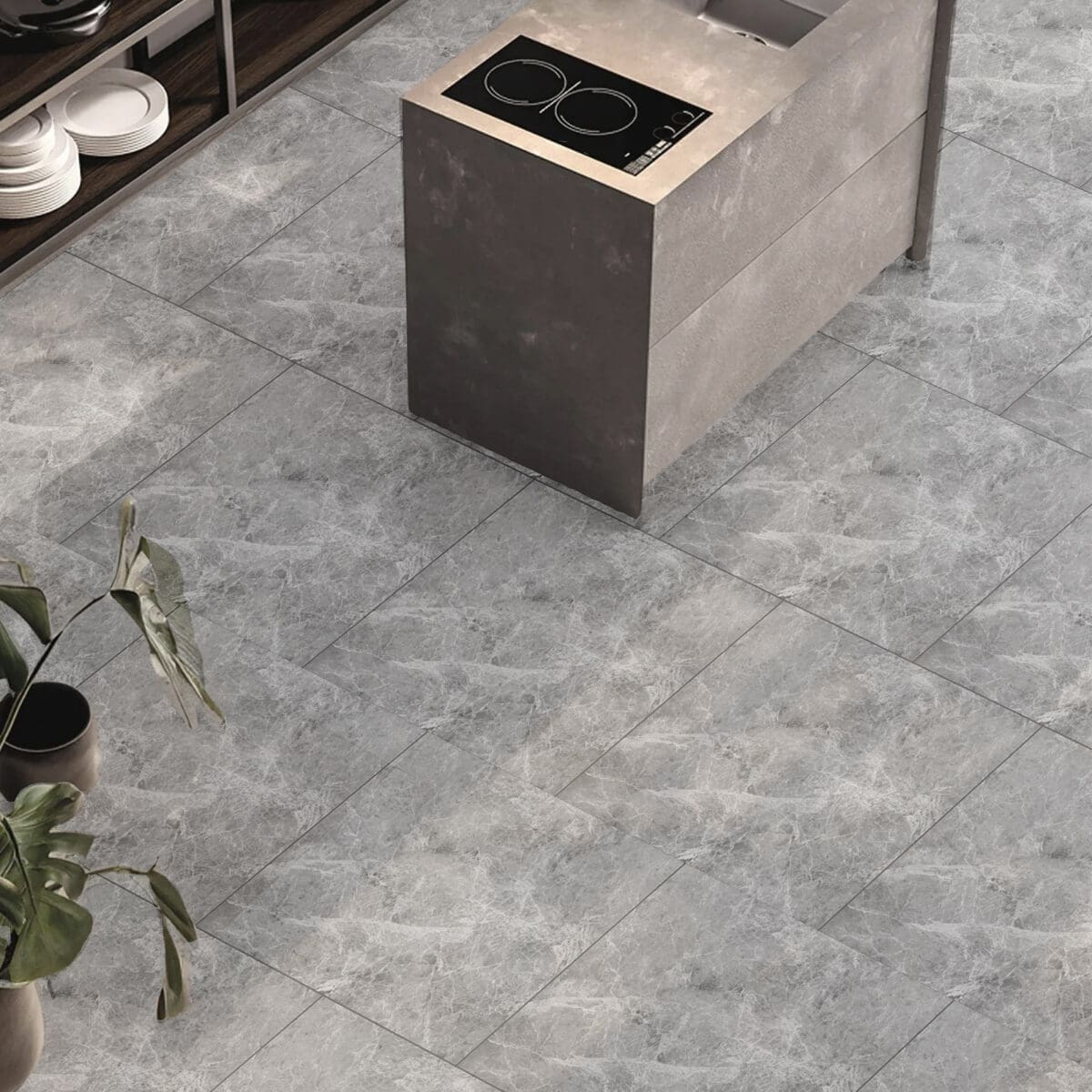 Serene Sanctuary Athens Gray Stock Look Vinyl Flooring in a modern kitchen, evoking timeless marble elegance with soft gray tones. This 100% waterproof vinyl resists scratches, stains, and dents, offering an effortless to clean, low-maintenance foundation for a tranquil and elegant home.