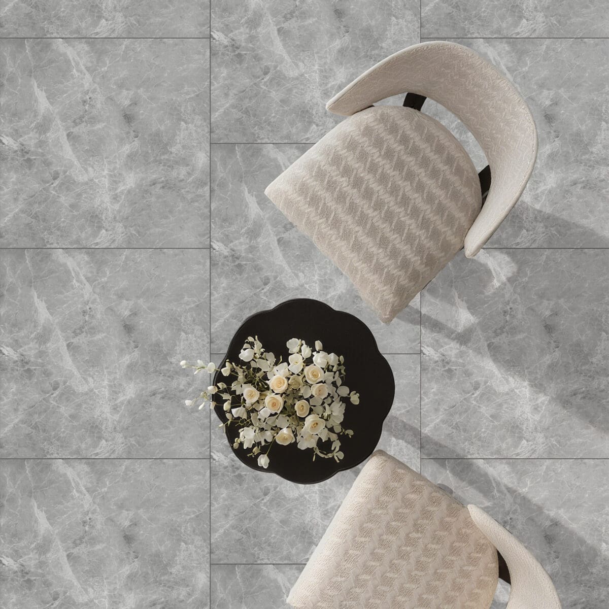 Serene Sanctuary Athens Gray Stock Look Vinyl Flooring in an elegant living room, transforming the space into a serene sanctuary with its soft, cloud-like gray tones. This 100% waterproof vinyl resists scratches, stains, and dents, providing a low-maintenance, timeless marble-look foundation.