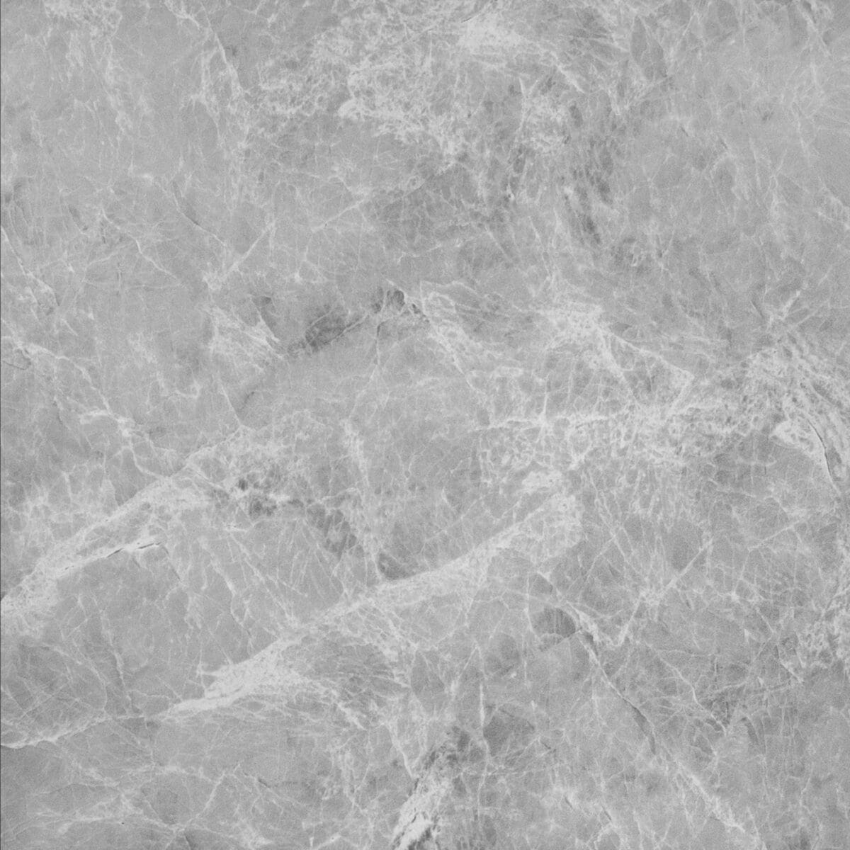 Close-up of a Serene Sanctuary Athens Gray Stock Look Vinyl Flooring tile, showcasing its soft, cloud-like gray tones and subtle veining that evoke genuine marble. This durable vinyl is 100% waterproof, resisting scratches, stains, and dents, perfect for a tranquil, elegant home.