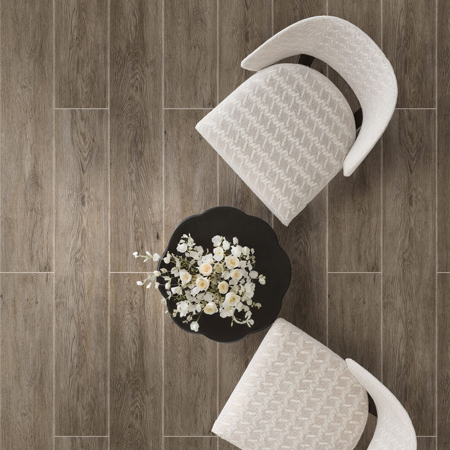 Rustic Modern Weathered Oak Wood Look Tile on a living room floor, seen from above, creating a bright, sophisticated atmosphere. This 100% waterproof porcelain tile offers unmatched durability and easy care for effortless, airy style.