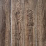 Real photo full view of Rustic Tawny Oak SPC flooring, highlighting its detailed knots and rich wood grain character.