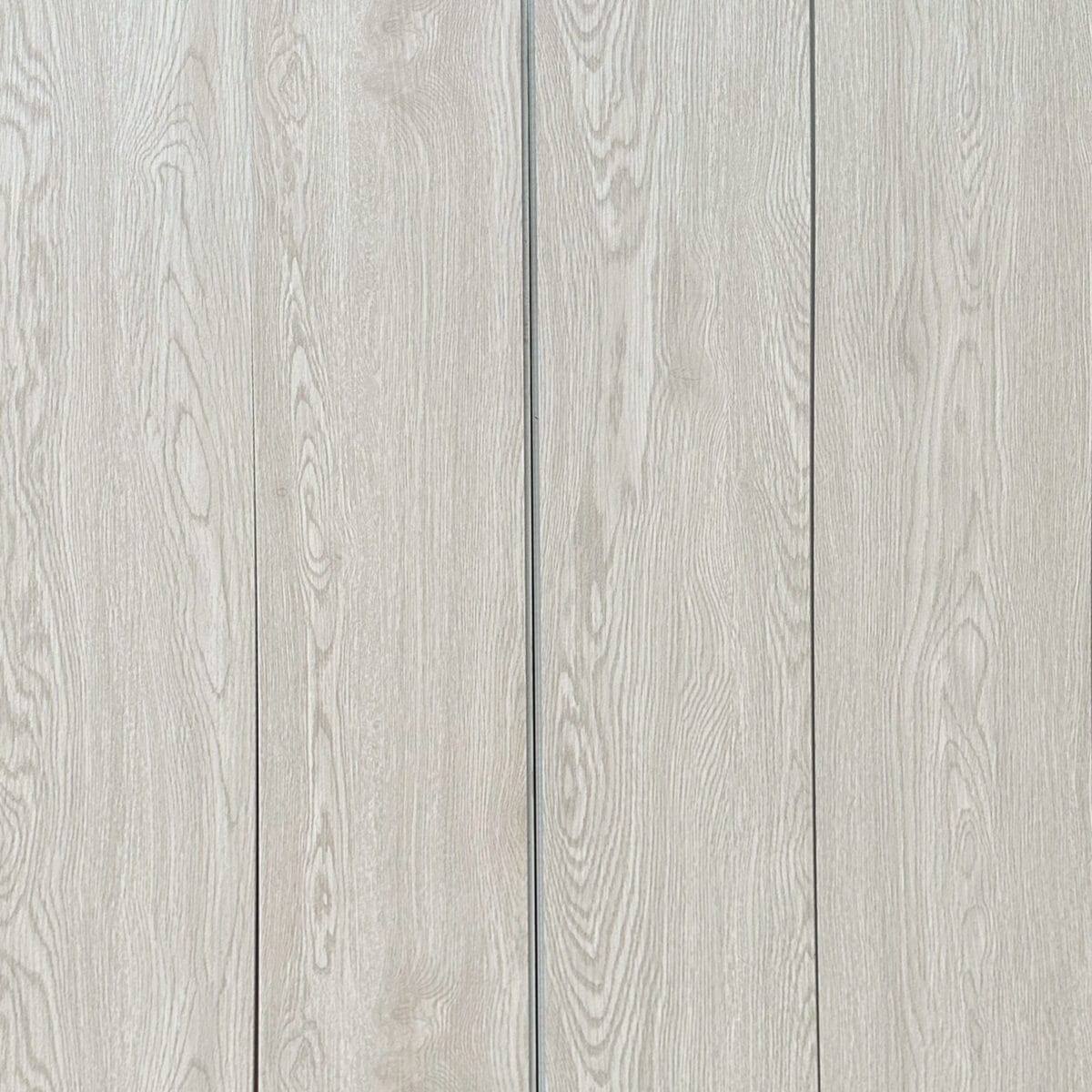 A seamless, full-frame view of Modern Whitewash Oak resilient wood-grain planks.