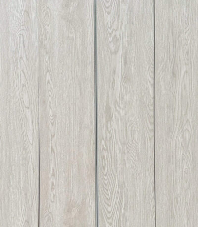 A seamless, full-frame view of Modern Whitewash Oak resilient wood-grain planks.