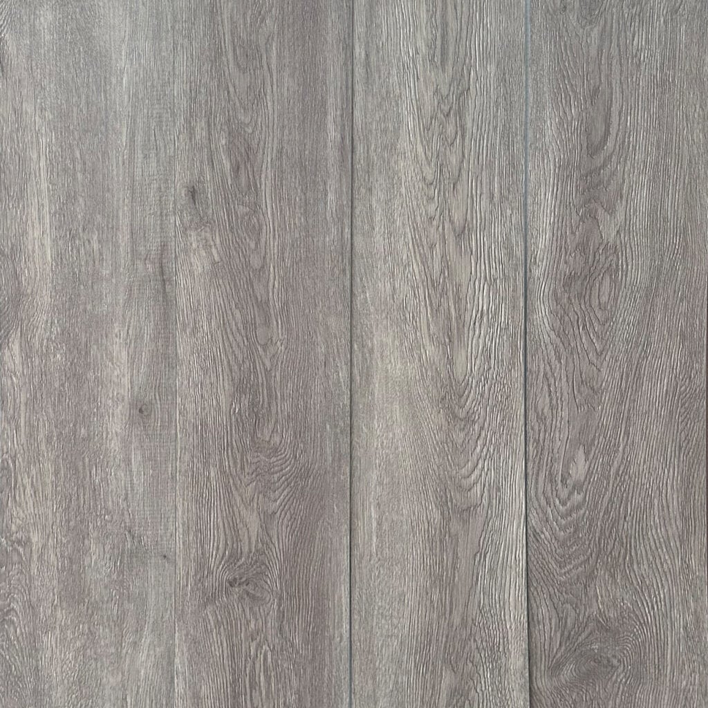 Seamless expanse of Modern Ash Grey vinyl planks showing a uniform, top-down view.