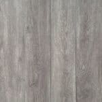 Seamless expanse of Modern Ash Grey vinyl planks showing a uniform, top-down view.