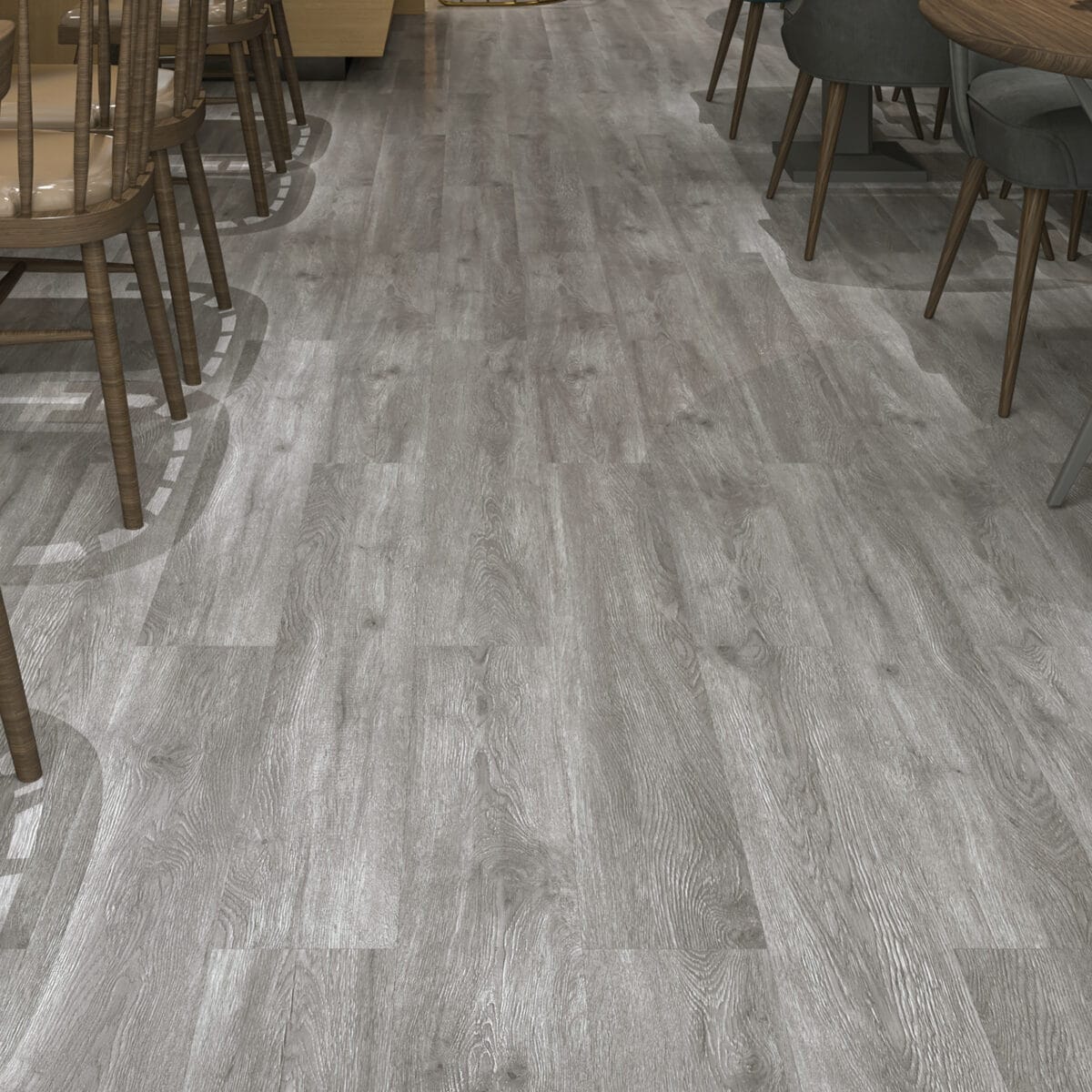 Proven Modern Ash Grey Wood Look SPC in a stylish cafe setting with dark wood furniture.