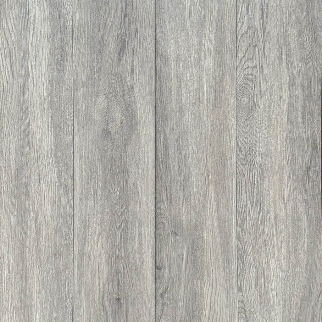 A top-down, seamless view of multiple Modern Silver Grey SPC planks laid together.