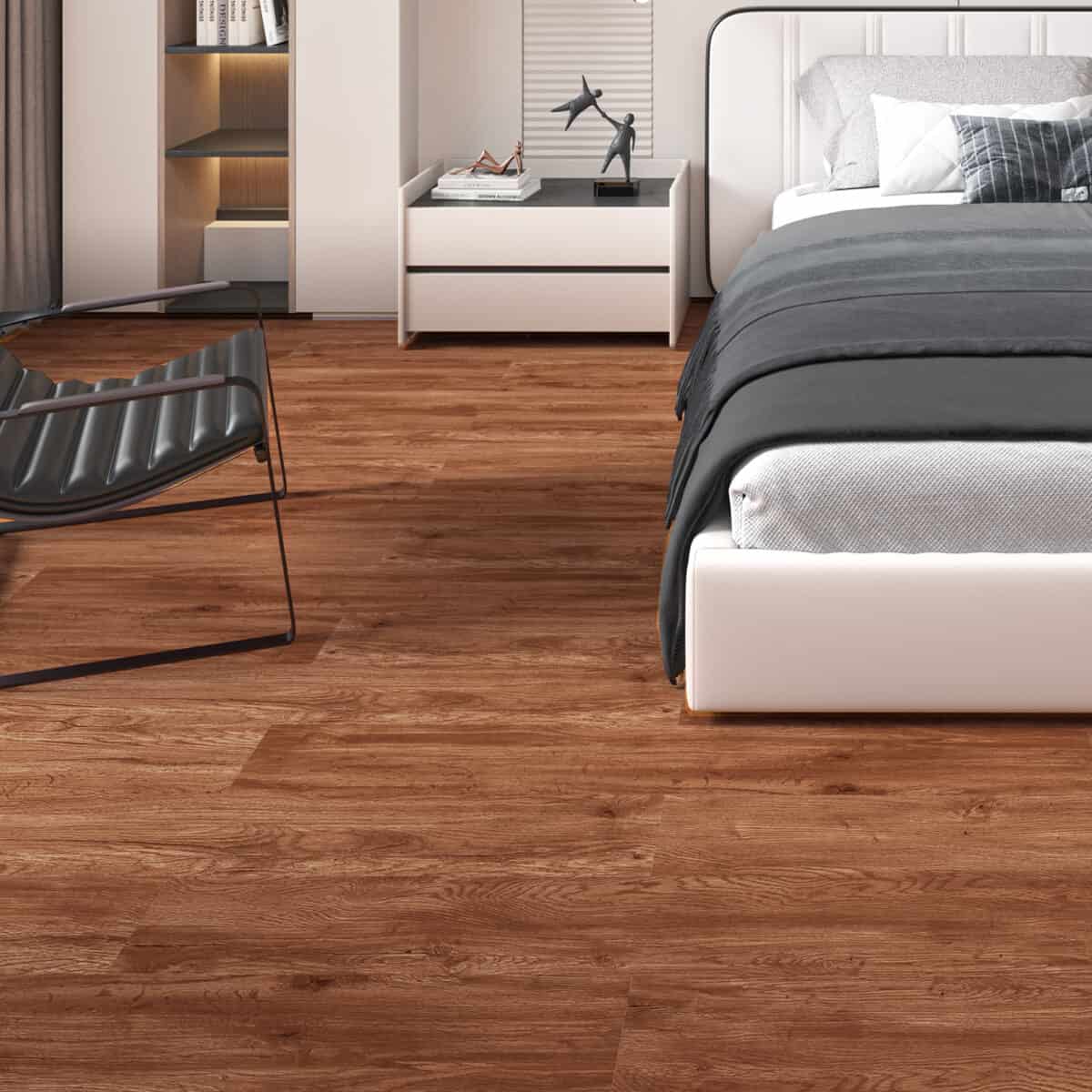Amazing Contemporary Warm Teak SPC flooring in a modern bedroom with a black leather chair and white furniture.