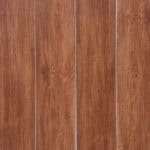 Full view of Contemporary Warm Teak SPC flooring planks showcasing their warm, reddish-brown color and consistent grain.