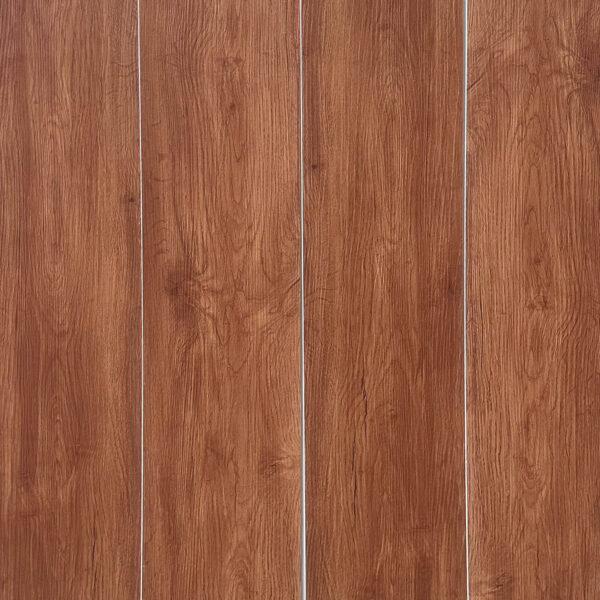 Full view of Contemporary Warm Teak SPC flooring planks showcasing their warm, reddish-brown color and consistent grain.