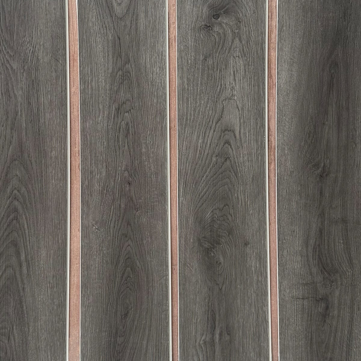 Real photo of Chic Charcoal Oak SPC planks laid out, showing the deep color and consistent grain for a seamless look.