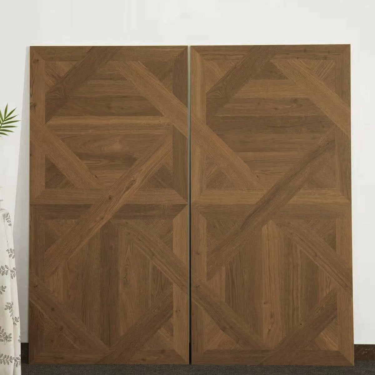 Real photo of Dynamic Geometric Teak Parquet Wood Look Tile planks, showcasing their intricate geometric pattern and rich golden teak tones.