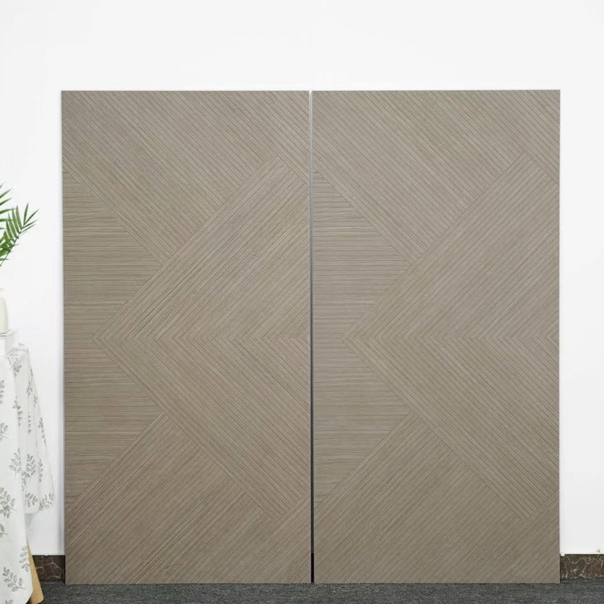 Real photo of Modern Minimalist Warm Grey Wood Look Tile planks, showcasing their sophisticated linear pattern and unique tactile texture.
