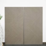 Real photo of Modern Minimalist Warm Grey Wood Look Tile planks, showcasing their sophisticated linear pattern and unique tactile texture.