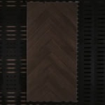 Real photo of a single Understated Luxury Dark Coffee Brown Wood Look Tile, showcasing its classic herringbone pattern and deep, rich wood grain.