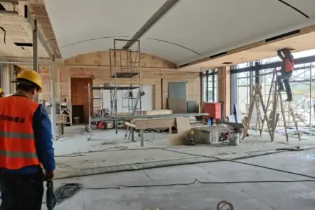 Reception desk at Dachang “Yujian Future”, Hebei — modern hall with wood-look porcelain tile finishes by vividcozytile