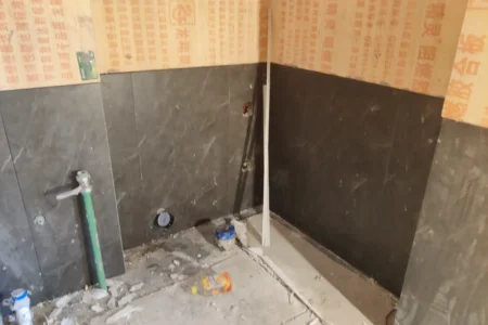 Reception hall under construction showing porcelain floor tile installation — Dachang “Yujian Future”, Hebei