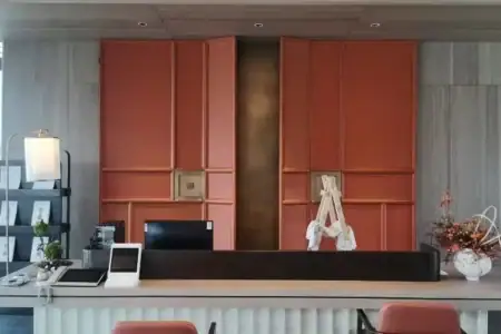 Restroom area with dark stone-look porcelain wall tiles during installation — Dachang “Yujian Future” reception hall, Hebei